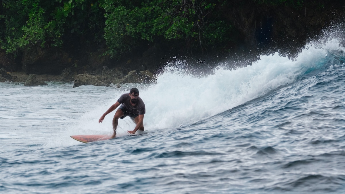Matt surfing in Siargao